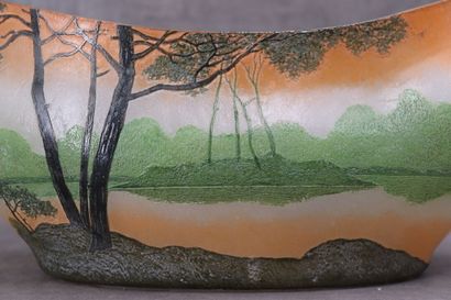LEGRAS. Planter with oval body and curved...