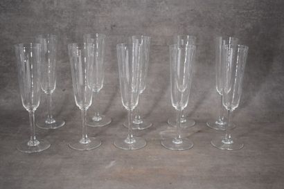 BACCARAT. Set of ten crystal champagne flutes,...