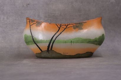 LEGRAS. Planter with oval body and curved...