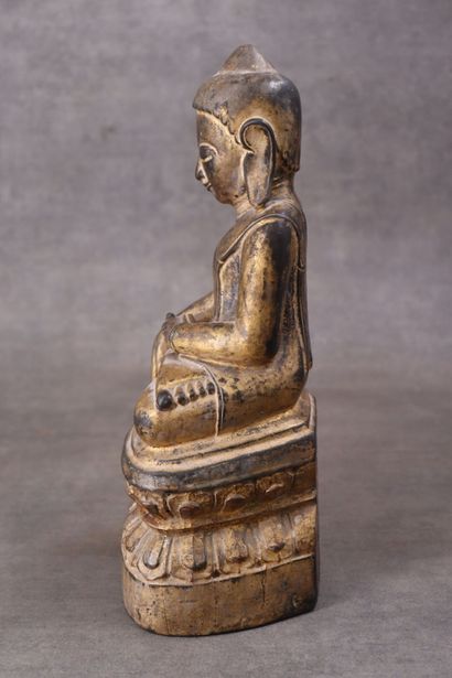 INDE. Divinité en bois sculpté et doré. Hauteur...