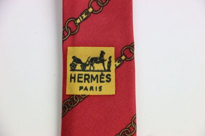 HERMES. Burgundy tie, in its box. Stain