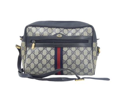 GUCCI. Shoulder bag in navy blue leather...
