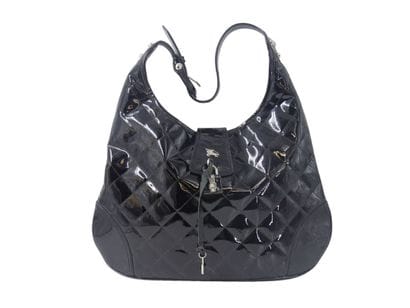 BURBERRY. Large black patent leather satchel...