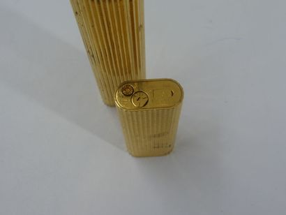 CARTIER. Meeting of two lighters including...