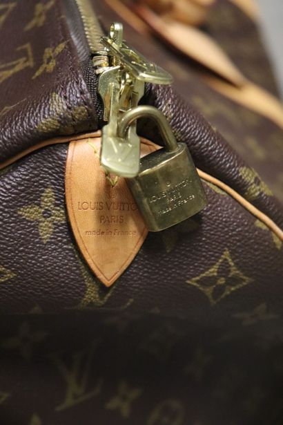 Louis Vuitton. Keepall bag in monogrammed...