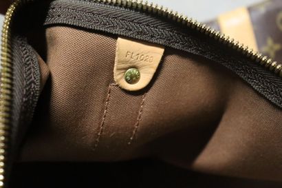 Louis Vuitton. Keepall bag in monogrammed...