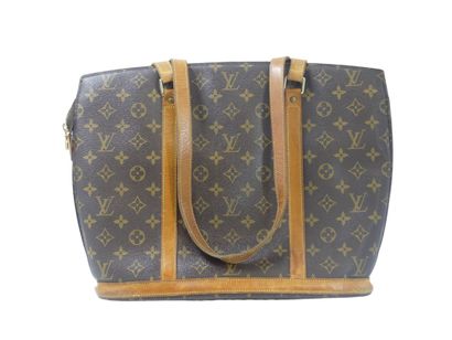 LOUIS VUITTON. Babylone bag in monogram canvas...