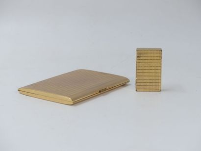 DUPONT. Lighter in gilded metal, signed and...