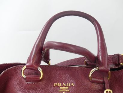PRADA. Tote bag in dark red grained leather,...