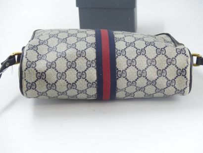GUCCI. Shoulder bag in navy blue leather...