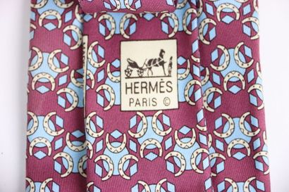 HERMES. Tie in its box, red or burgundy color....