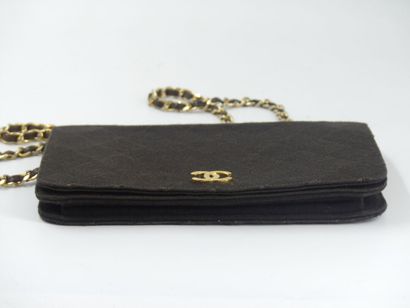 CHANEL. Brown jersey clutch bag, chain handle...