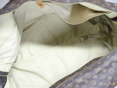 LOUIS VUITTON. Large soft suitcase in monogram...