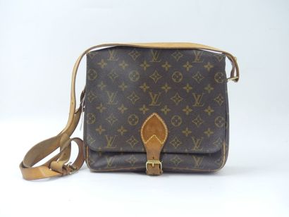 LOUIS VUITTON. Cartridge bag in monogram...