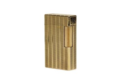 S.T. DUPONT BRIQUET in gilded metal with...