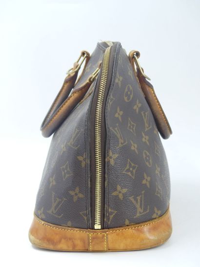 LOUIS VUITTON. Alma bag in monogram canvas...