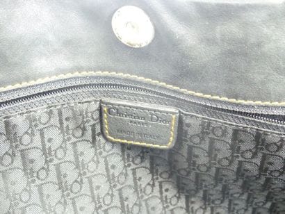 DIOR. Saddle bag in black and gold calfskin,...