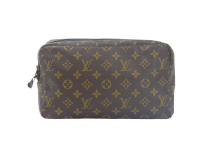 LOUIS VUITTON. Toilet bag in monogram canvas,...