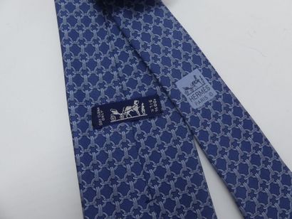 HERMES. Silk tie, navy blue background with...
