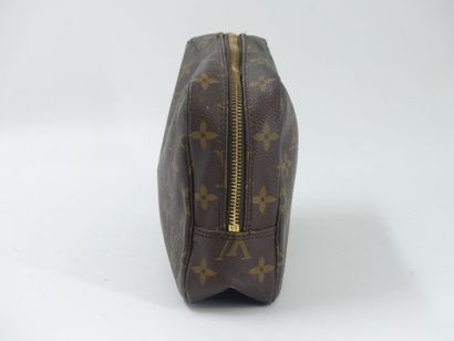 LOUIS VUITTON. Toilet bag in monogram canvas...