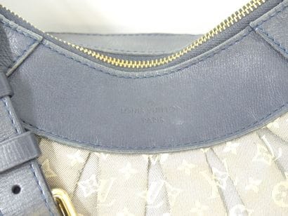 LOUIS VUITTON. Shoulder bag in navy leather...