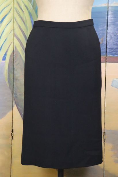 CHANEL. Meeting of two black wool skirts,...