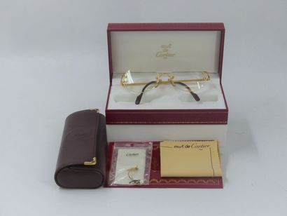 CARTIER, Must. Pair of eyeglasses with gold...