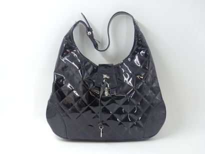 BURBERRY. Large black patent leather satchel...