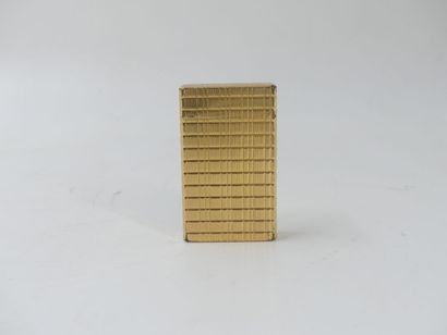 DUPONT. Lighter in gilded metal, signed and...