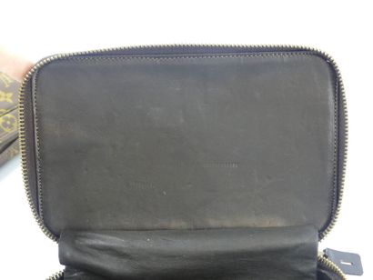 LOUIS VUITTON. Lot composed of a toiletry...