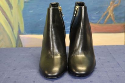 BURBERRY. Pair of black leather heeled boots,...