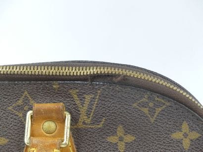 LOUIS VUITTON. Alma bag in monogram canvas...