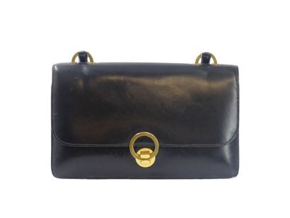 HERMES. Ring bag in black box calf, gold...