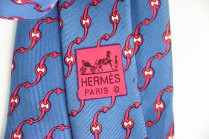 HERMES. Tie in its box, blue color with red...
