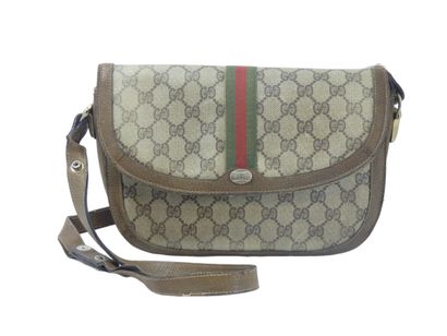 GUCCI. Shoulder bag in coated canvas and...
