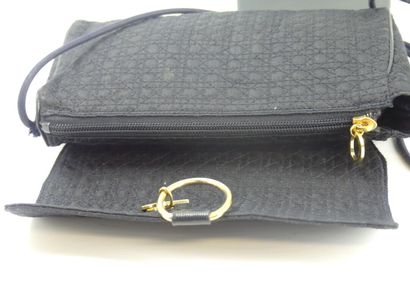 Christian DIOR. Clutch bag in navy blue fabric...