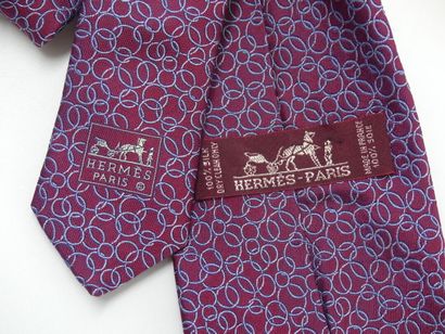 HERMES. Silk tie, cherry background with...