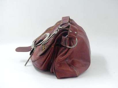 Christian DIOR. Saddle bag in red and gold...