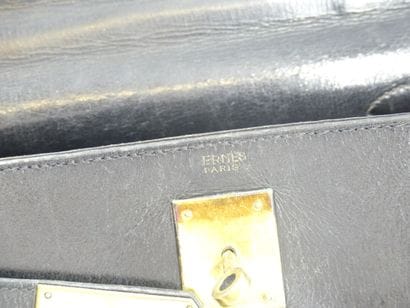 HERMES. Kelly bag 28cm in black box, gold...