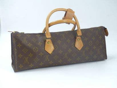 LOUIS VUITTON. Triangular bag in monogram...