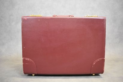 CARTIER. Must. Important briefcase in burgundy...