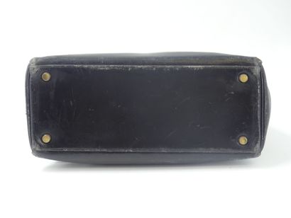 HERMES. Kelly bag 28cm in black box, gold...
