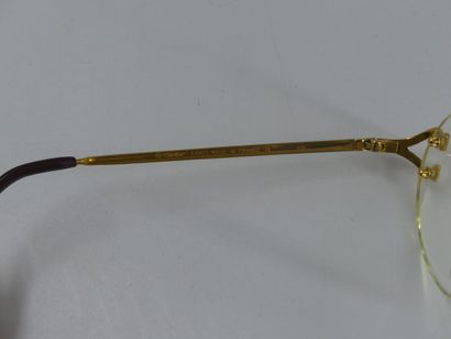 CARTIER, Must. Pair of eyeglasses with gold...