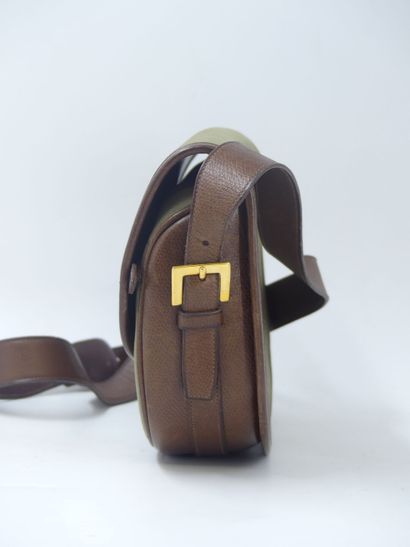 HERMES. Green canvas and leather golf ball...