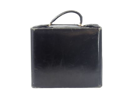HERMES. Large toiletry bag in black box calf,...