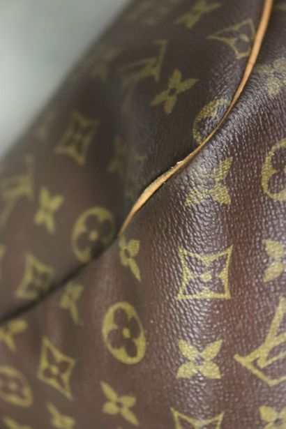 Louis Vuitton. Keepall bag in monogrammed...