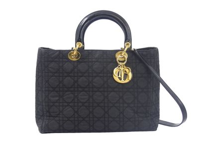 Christian Dior. Lady Dior handbag in black...