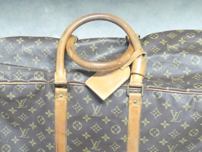 LOUIS VUITTON. Large soft suitcase in monogram...