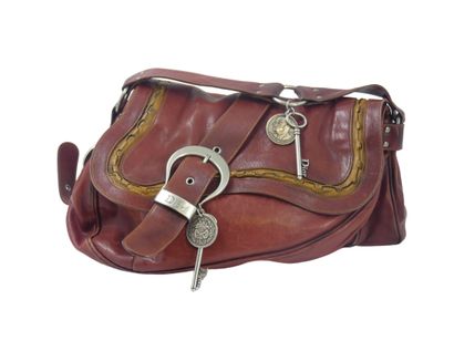 Christian DIOR. Saddle bag in red and gold...