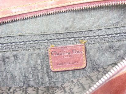 Christian DIOR. Saddle bag in red and gold...